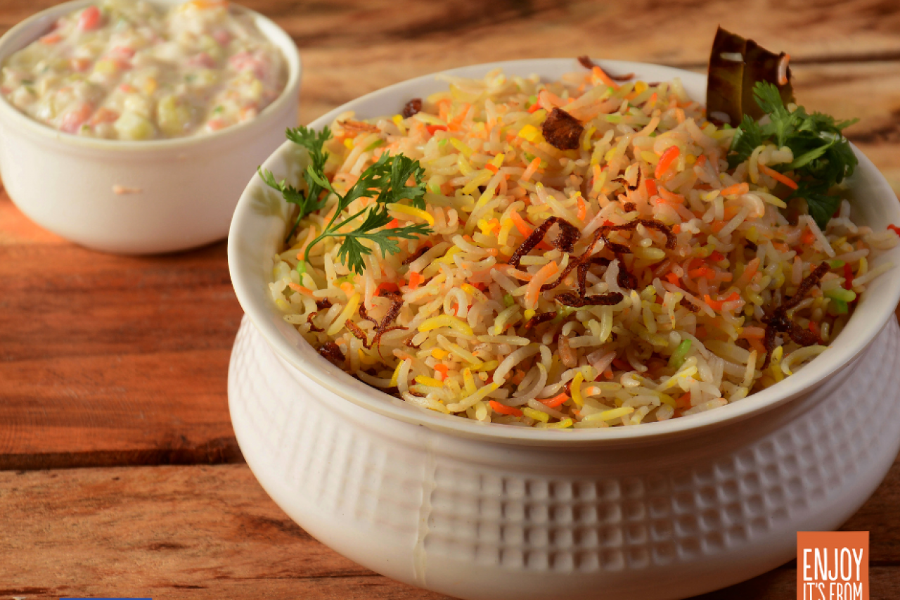 Hyderabadi Dum Biryani with European Corinthian black raisins 